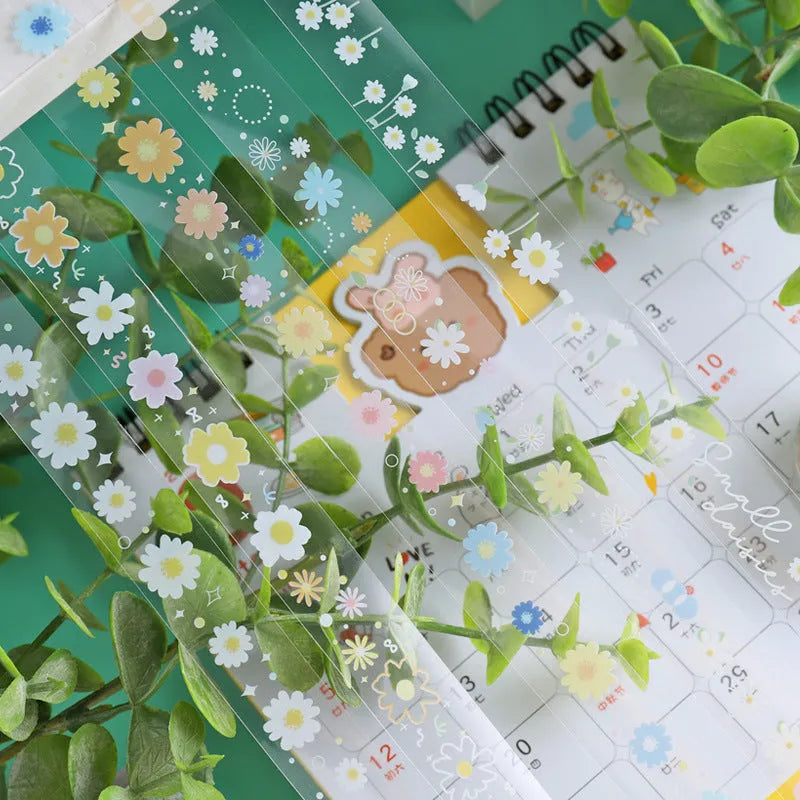 Transparent adhesive tape with colourful Midsummer Daisy cartoon pattern decoration on roll