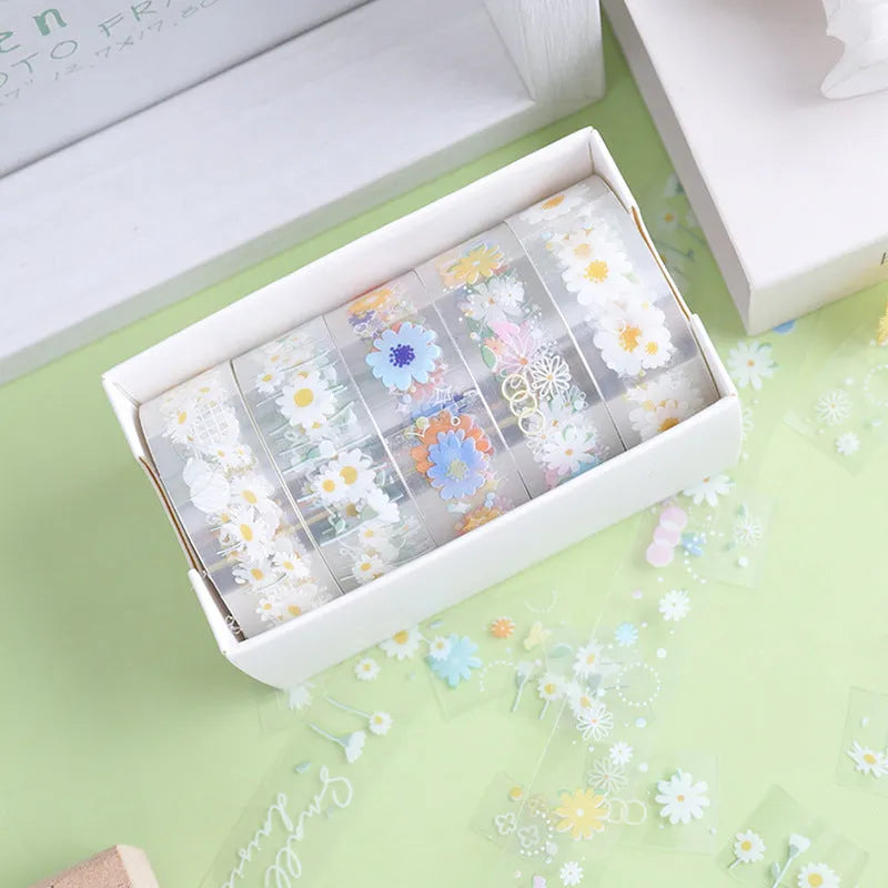 Transparent adhesive tape with colourful Midsummer Daisy cartoon pattern decoration on roll