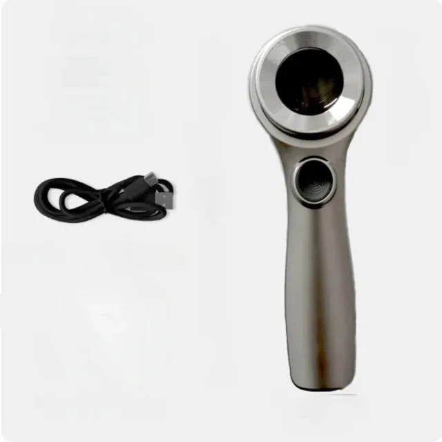 Black metal jeweller's loupe magnifying glass with adjustable stand on a wooden desk.
