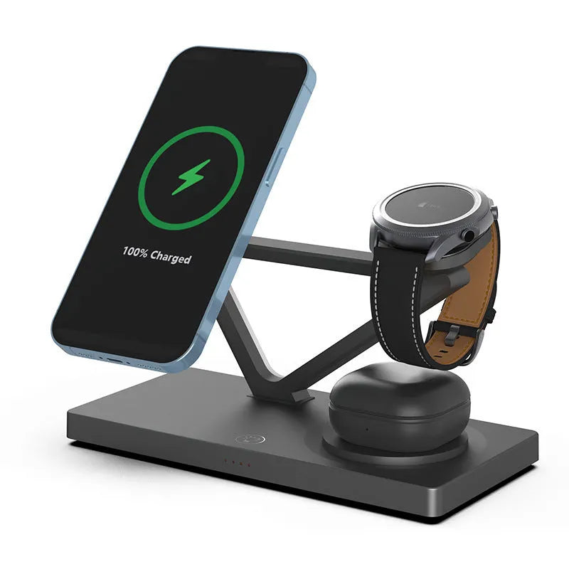 White five-in-one wireless charging station with night lamp, magnetic phone bracket, and watch charging pad on a bedside table.
