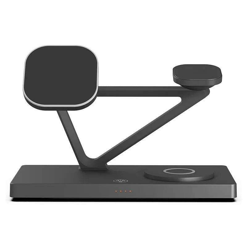White five-in-one wireless charging station with night lamp, magnetic phone bracket, and watch charging pad on a bedside table.