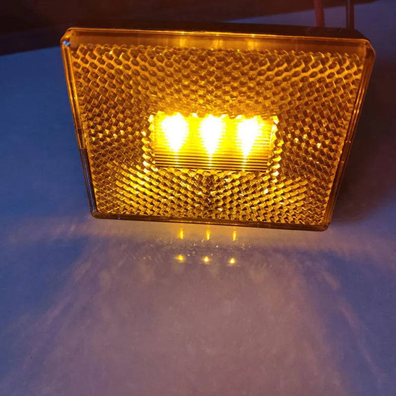 LED trailer side clearance lamp with transparent UV-resistant cover