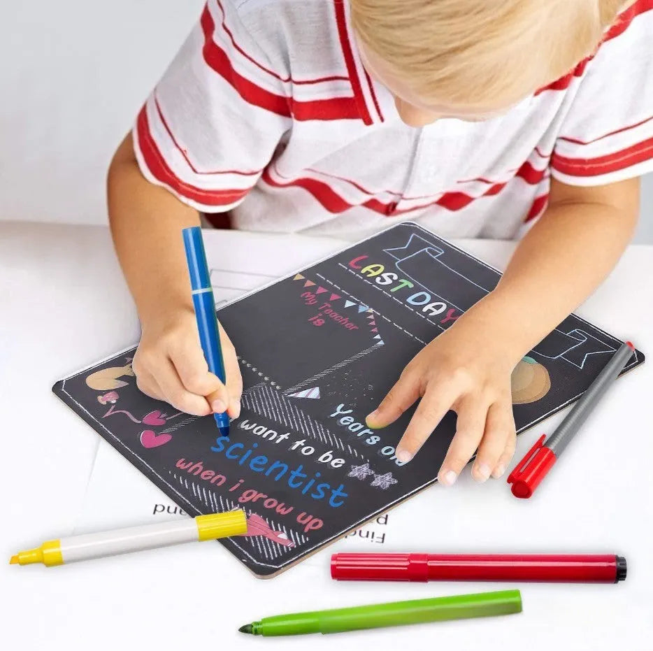 Black wooden First Day of School blackboard sign measuring 255mm by 300mm