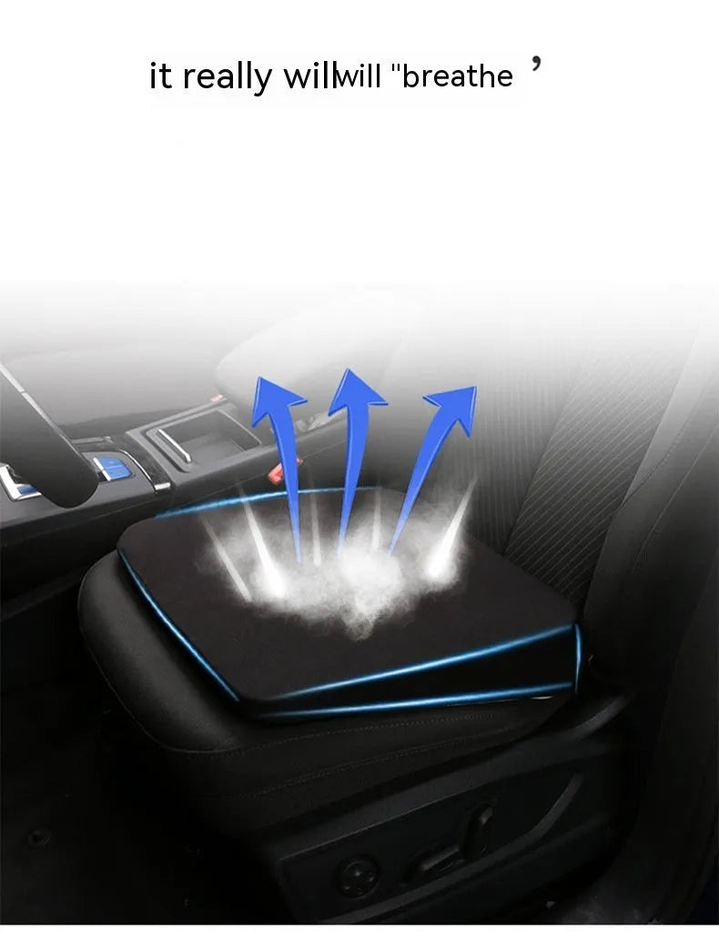 Black thick memory foam car seat cushion on a driver's seat
