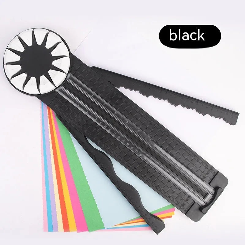 Pink plastic paper cutting machine with dotted alignment guides and 12 cutting patterns