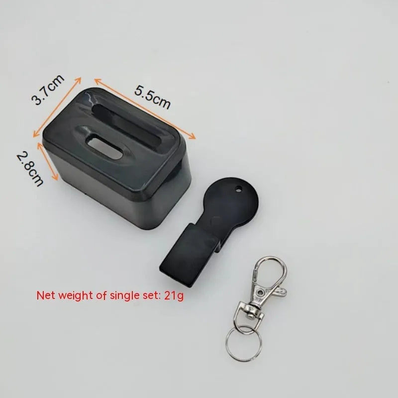 Black and red seat belt lock protective clamp made from ABS plastic
