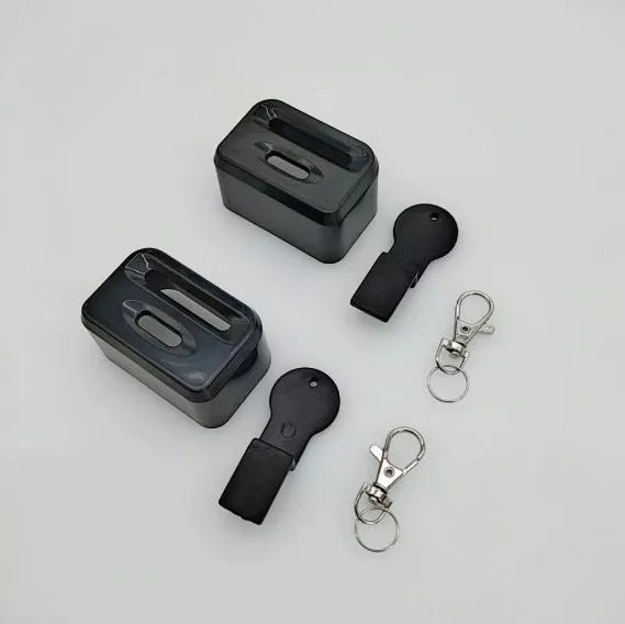 Black and red seat belt lock protective clamp made from ABS plastic