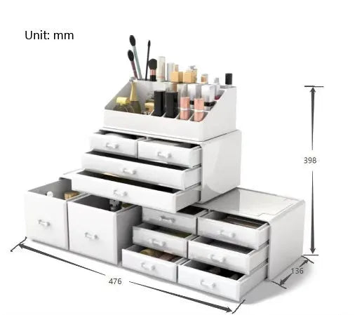 Acrylic three-layer cosmetics storage box in transparent finish with organised compartments on a dressing table