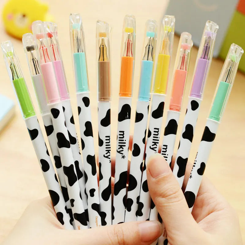 Pack of twelve assorted colour gel pens with 0.38mm fine tips and plastic cow print design barrels.