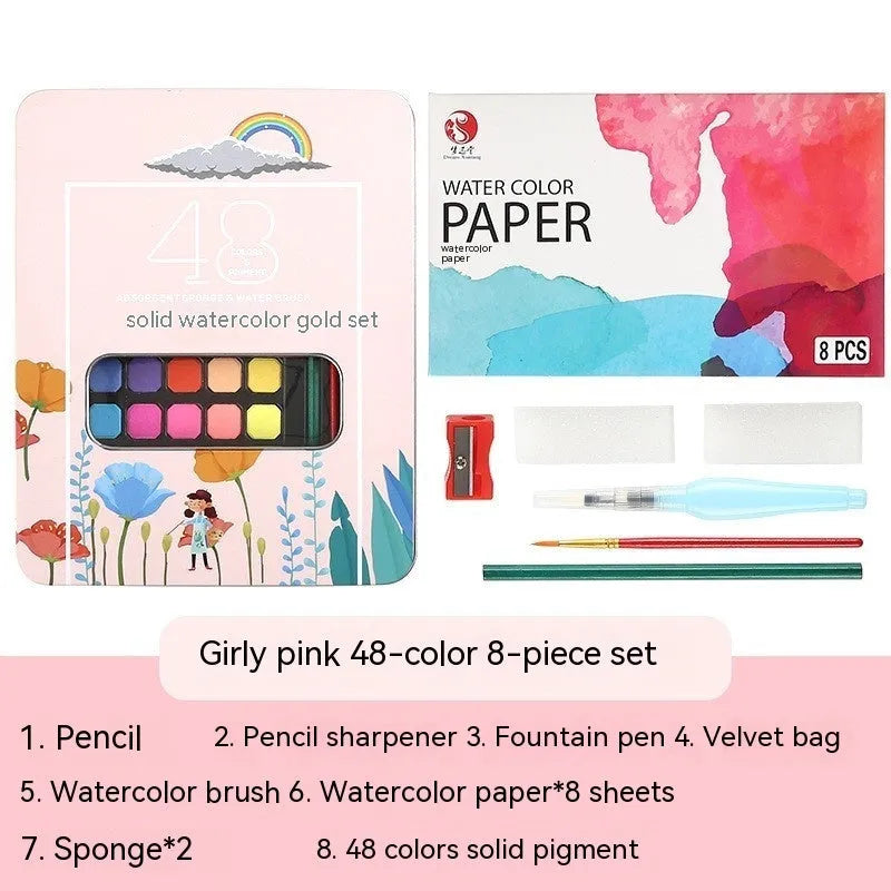 Box of 48 solid watercolour paint cakes showing colours including Black Knight, Girl Pink, and Sunshine Blue.