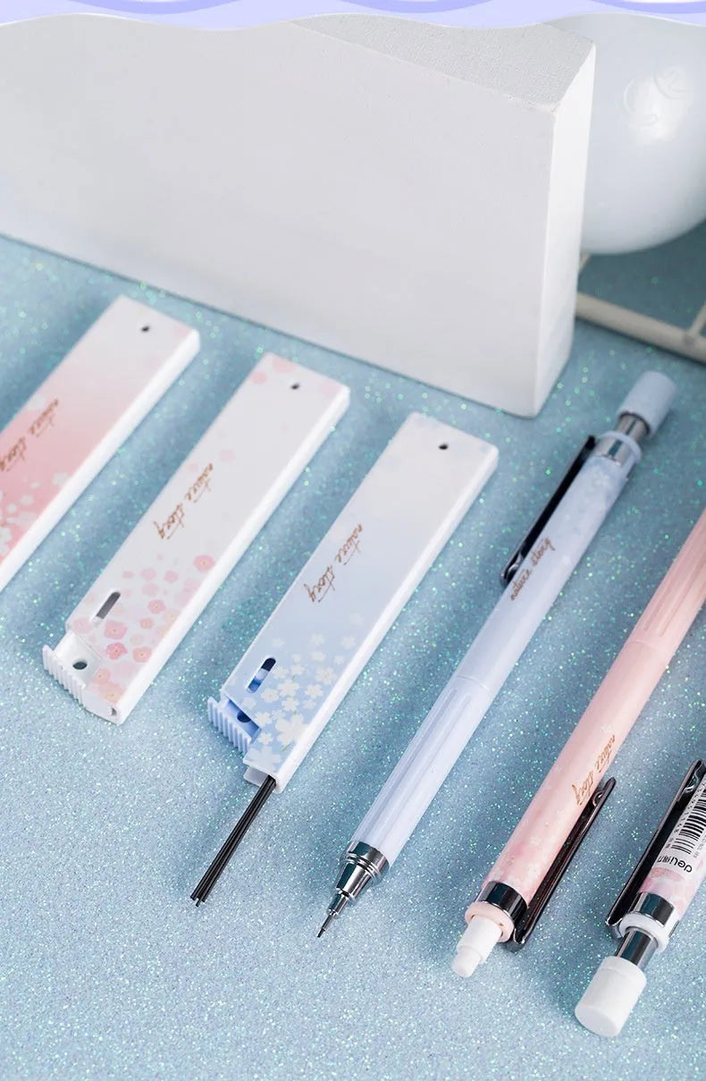 Three cartoon design 0.5mm automatic pencils with HB lead refills in mixed colours
