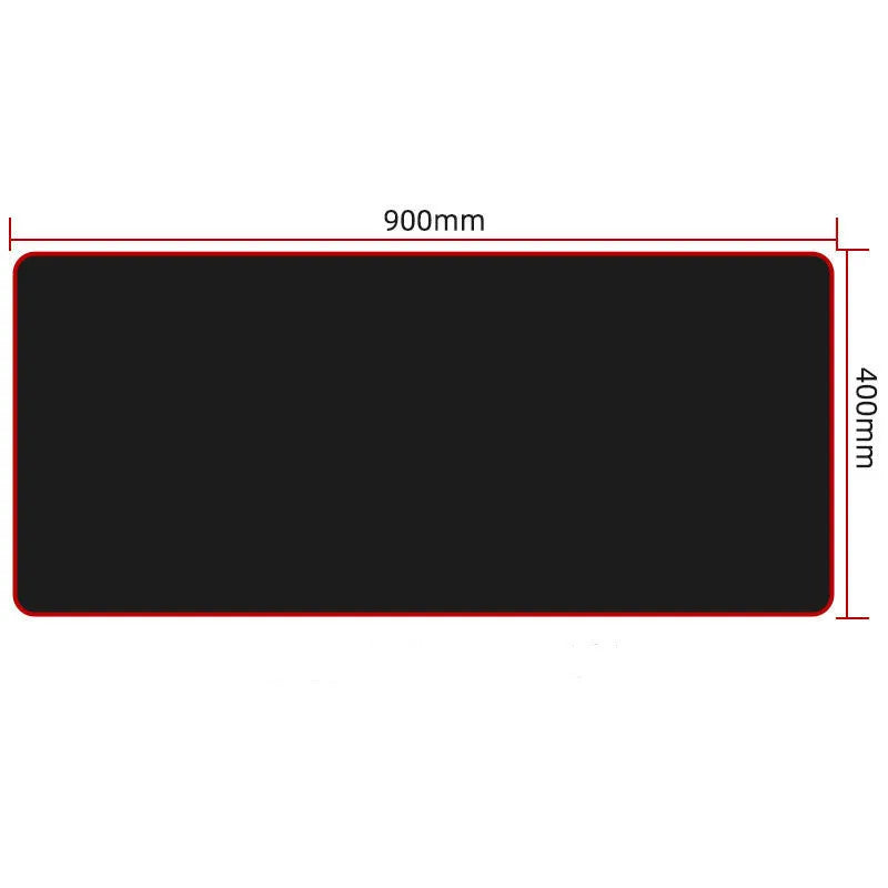 Extra long black mouse pad with stitched edges on a desk showing keyboard and mouse placement