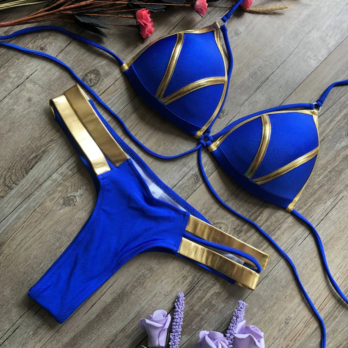 Women's bronzing bikini swimsuit in nylon with cotton lining and chest pads.