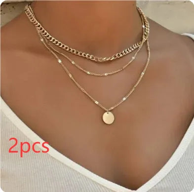 Women's multilayer necklace with disc pendant and clavicle chain in gold or silver electroplated alloy
