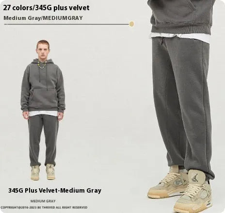 Men's solid colour velvet cotton sweatpants with ankle banding detail shown in dark brown.