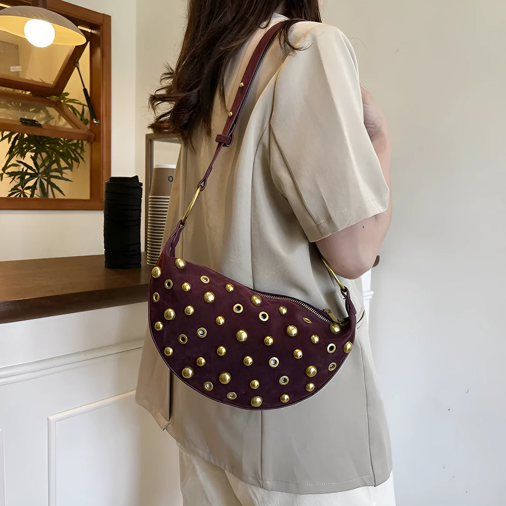 Retro rivet bag in frosted imitation buckskin suede with dumpling shape and sewing line details