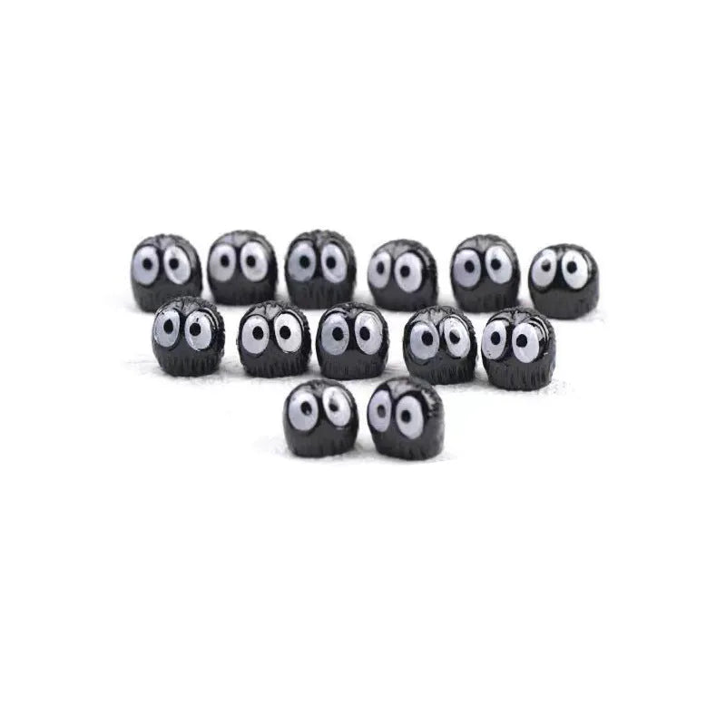 Small black cartoon coal resin decoration for car interior, approx 1cm, with traceless tape.