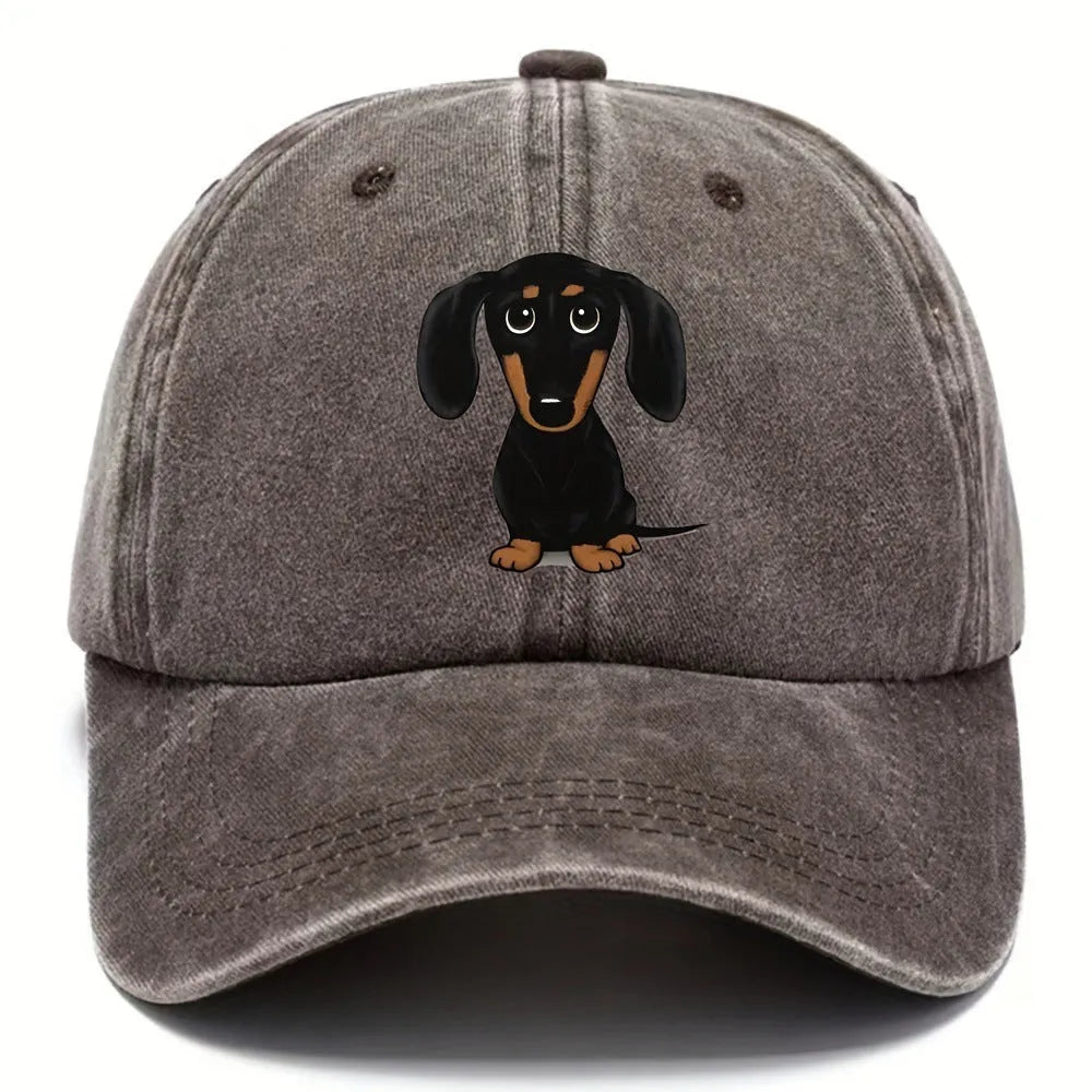 Retro washed blue cotton baseball cap with a white embroidered Dachshund dog on the front.