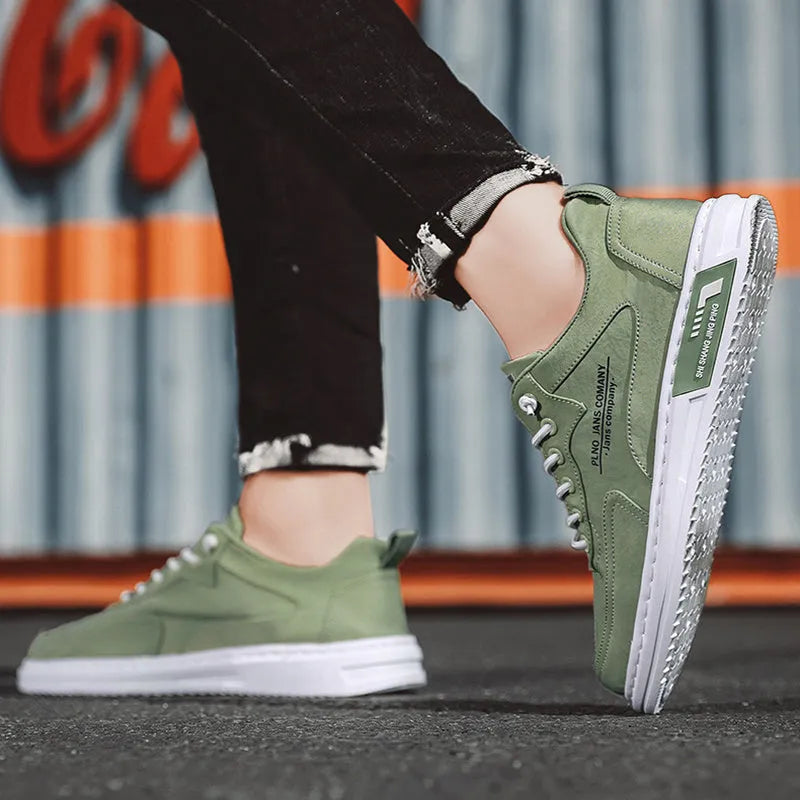 Men's canvas sneakers with letter print, elastic lace-up, breathable mesh lining, platform rubber sole, available in green black grey.