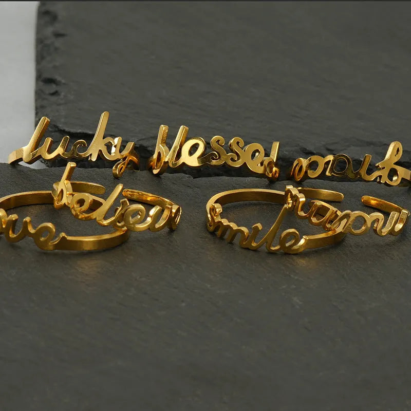 Gold electroplated stainless steel adjustable open ring with letter design, unisex style