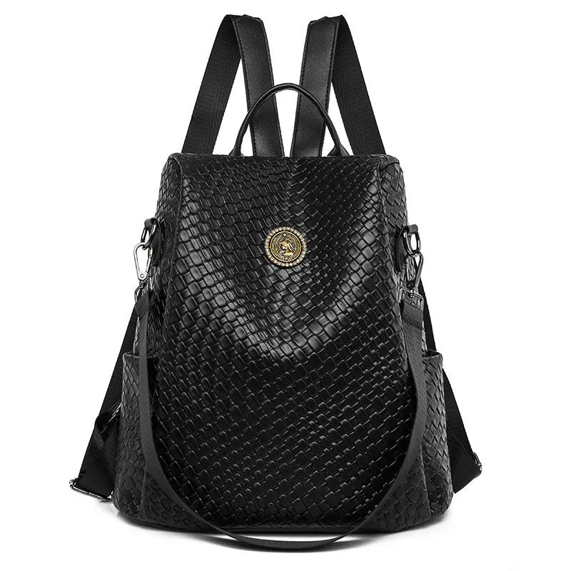 Women's anti-theft backpack in black PU material with multiple compartments and urban styling