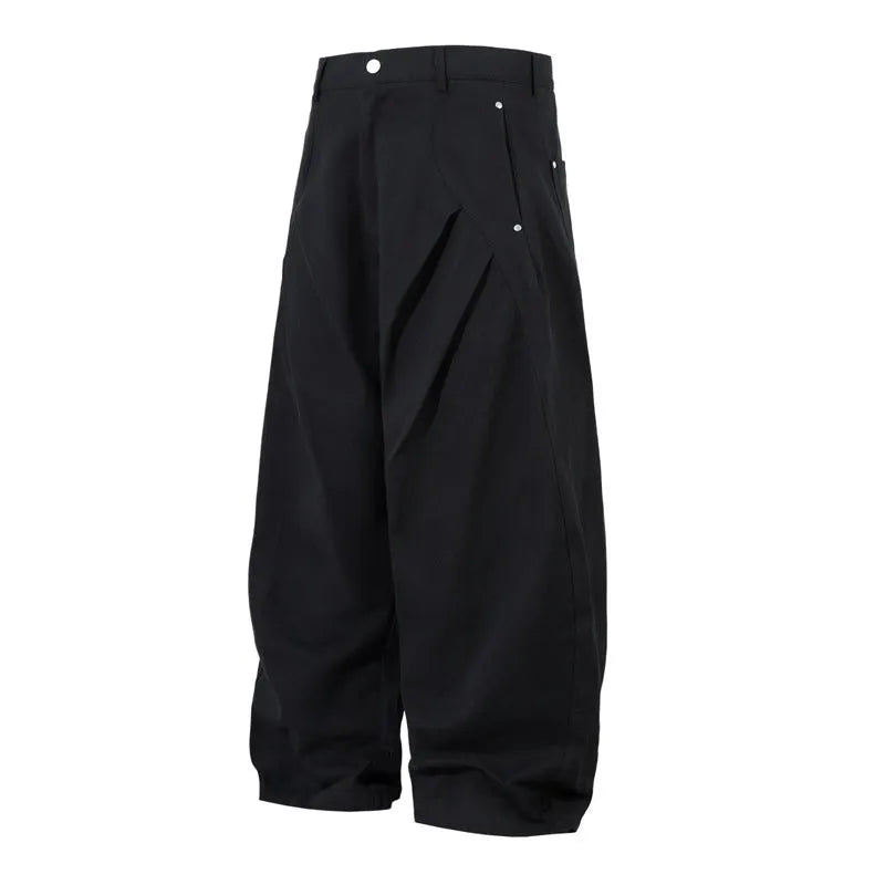 Men's black cotton pleated machete trousers with wide legs and elastic mid waist