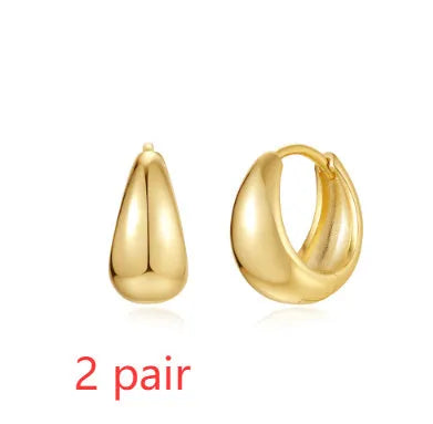 Brass diamond earclip earrings with electroplated gold finish and geometric round design