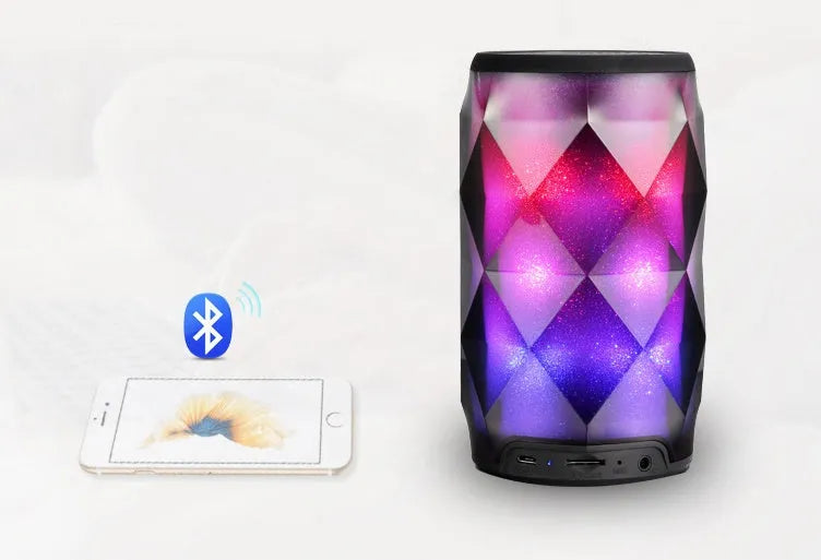 Black crystal diamond-cut Coke can shaped Bluetooth speaker and lantern with colourful LED lights.