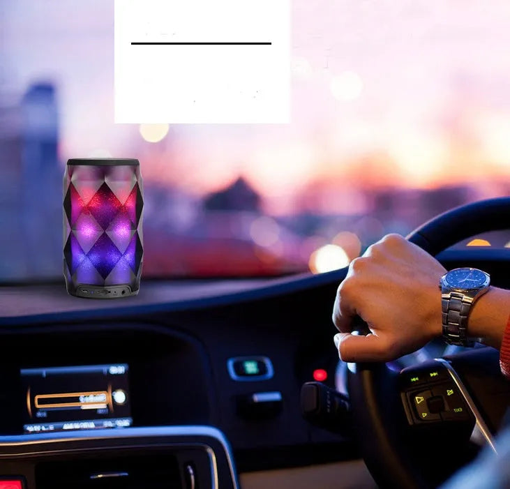 Black crystal diamond-cut Coke can shaped Bluetooth speaker and lantern with colourful LED lights.