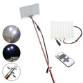 White LED fishing rod light mounted on a telescopic pole with remote control for outdoor use.