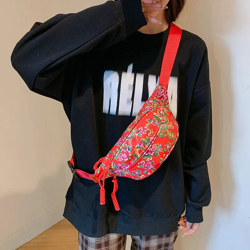 Women's western style waist bag with big flower decoration in black, red, green or blue colours