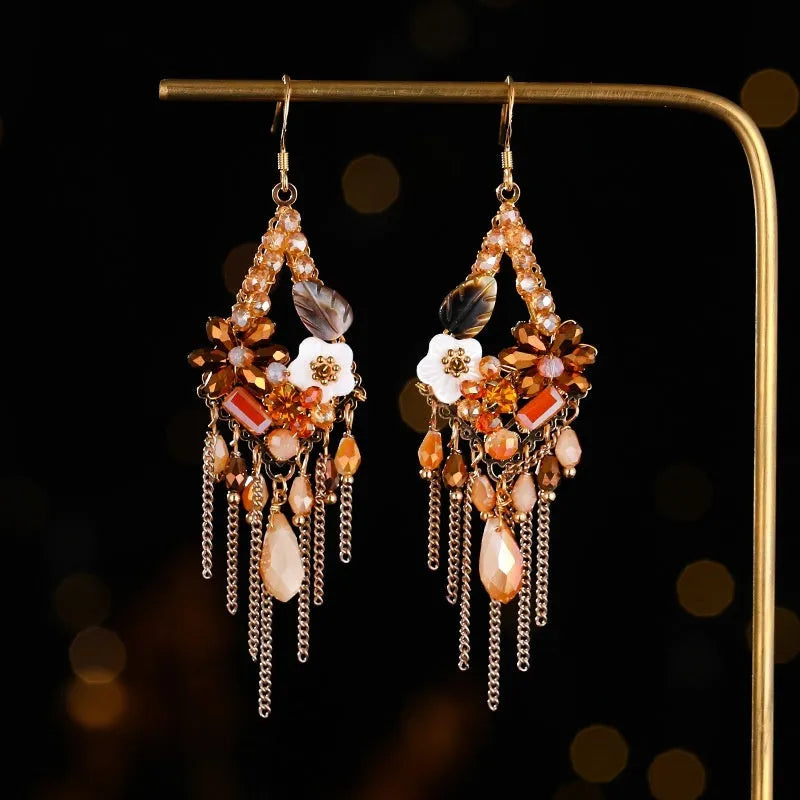 Hand-woven Bohemian diamond-shaped earrings in artificial crystal and alloy, available in three colours