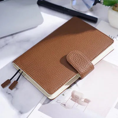 A6 loose-leaf cowhide diary with lychee pattern cover, 12 x 16.5cm, in off white, pink, or white.