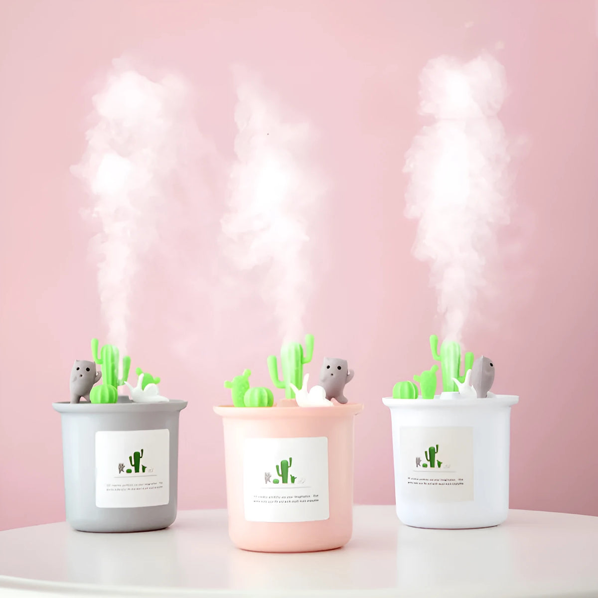 Creative cute pet vase-shaped ultrasonic humidifier in ivory white with USB cable on desk
