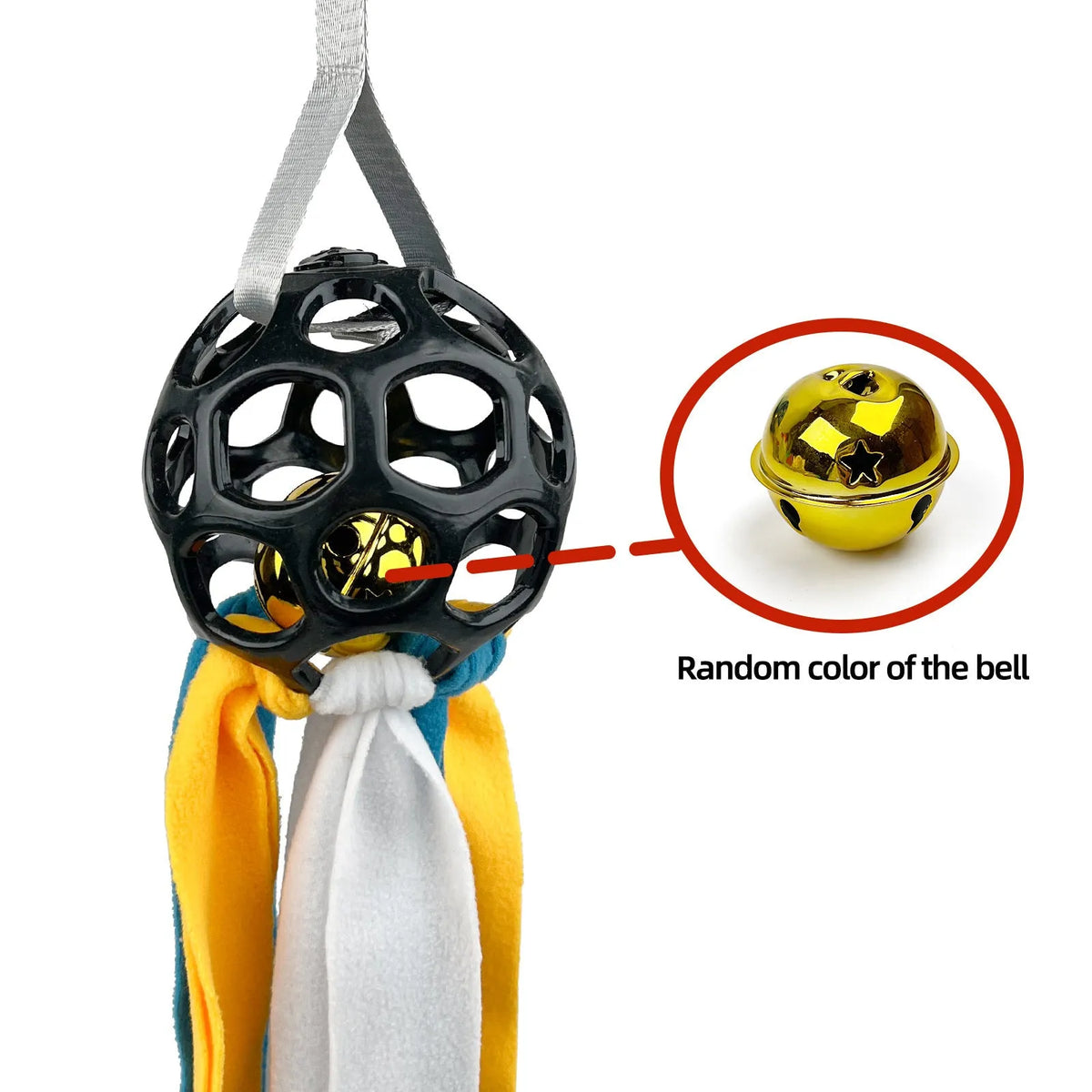 Interactive hollow TPR bell toy ball for dogs and cats in green colour on a surface