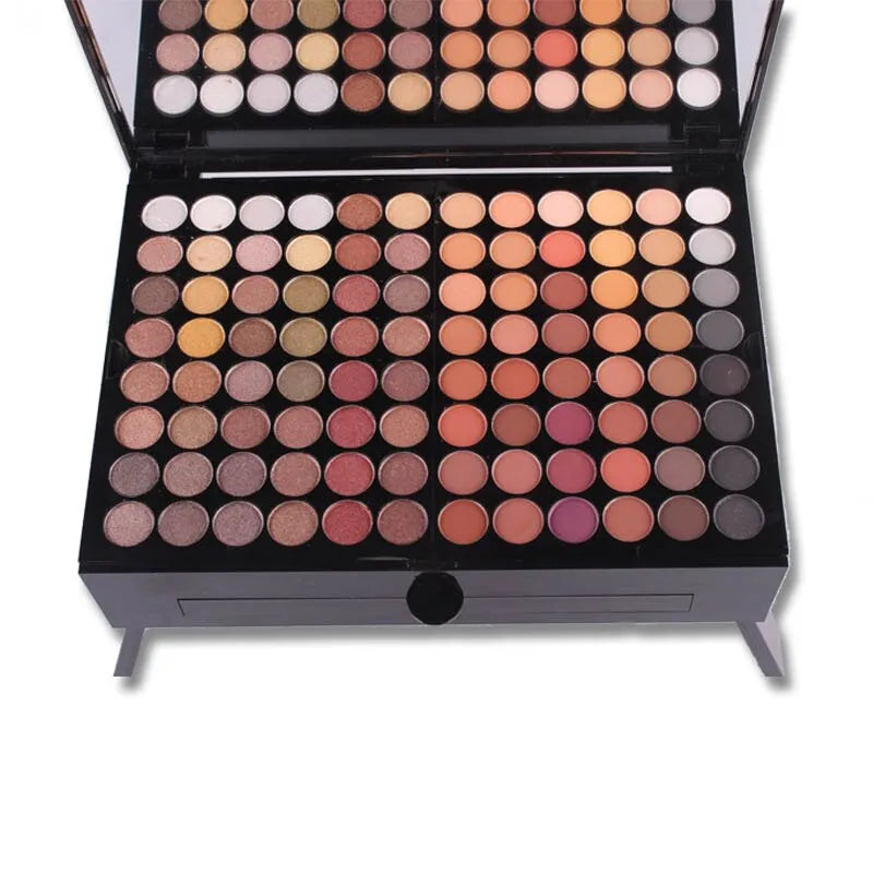 Piano-shaped makeup palette with 190 colour pans including eyeshadows, blush, and face powder