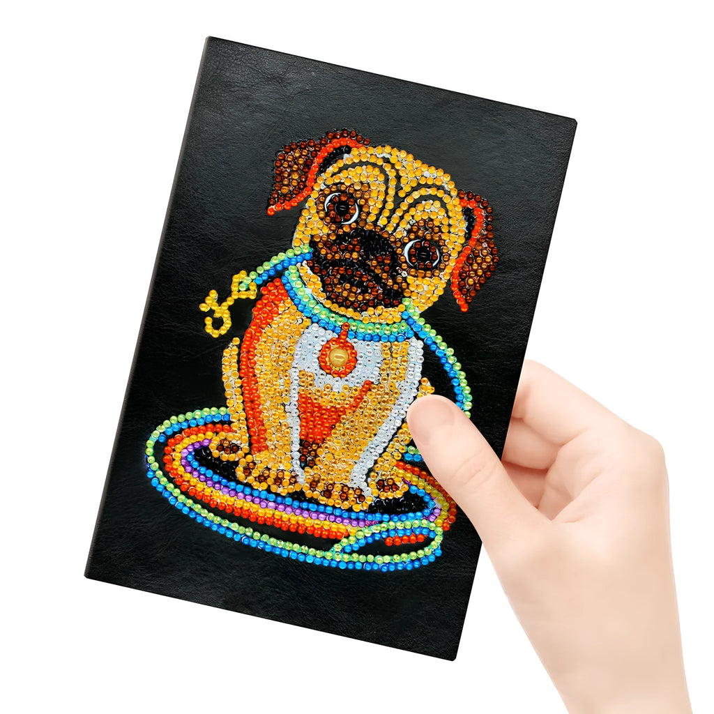 Black A5 DIY diamond painting notebook open showing pages for glitter artwork