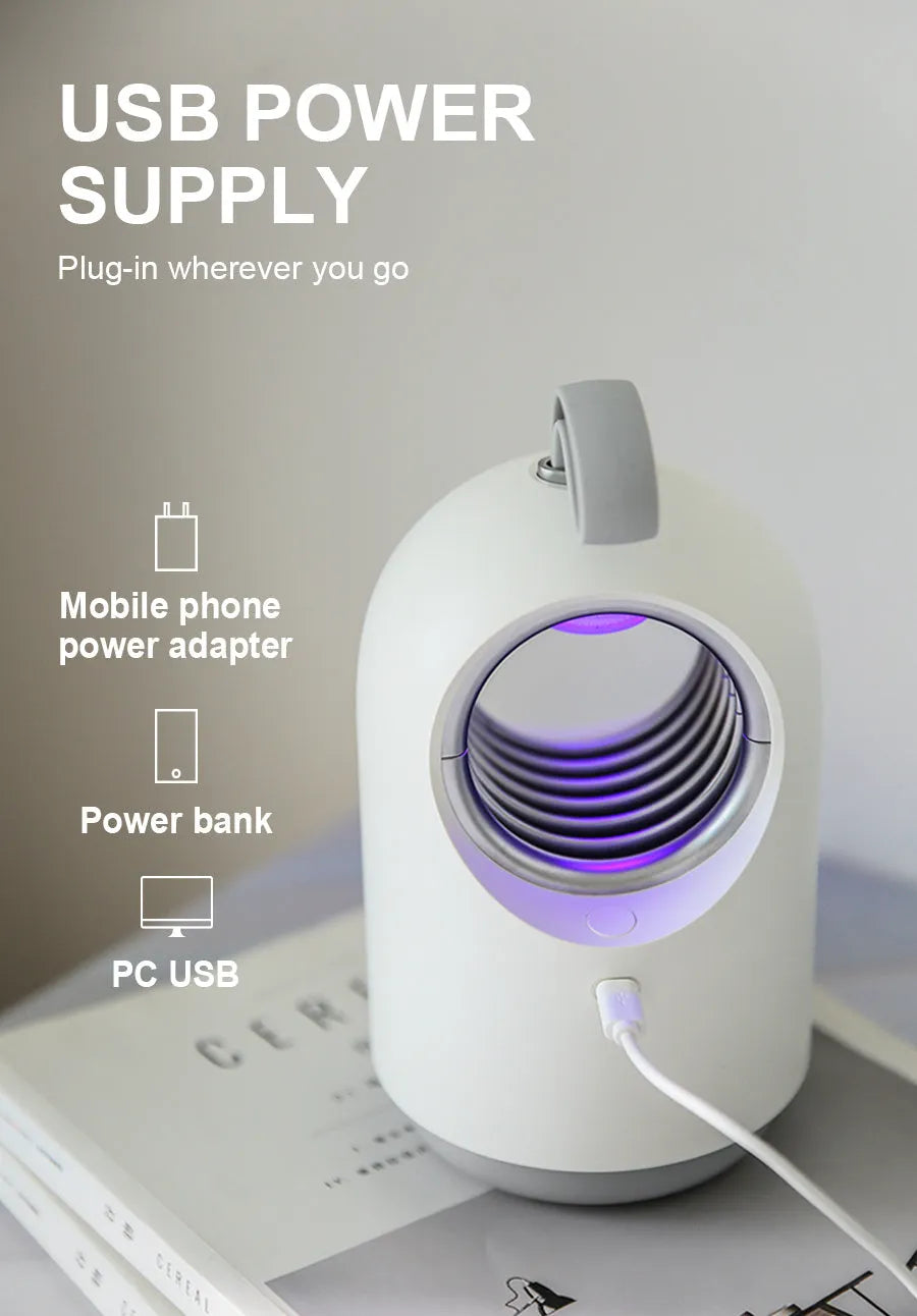 White or blue portable USB mosquito killer lamp with a top carry handle.