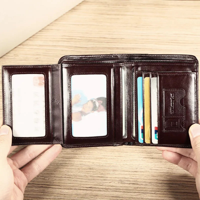 Men's black leather wallet showing multiple card slots, coin pocket, and document section
