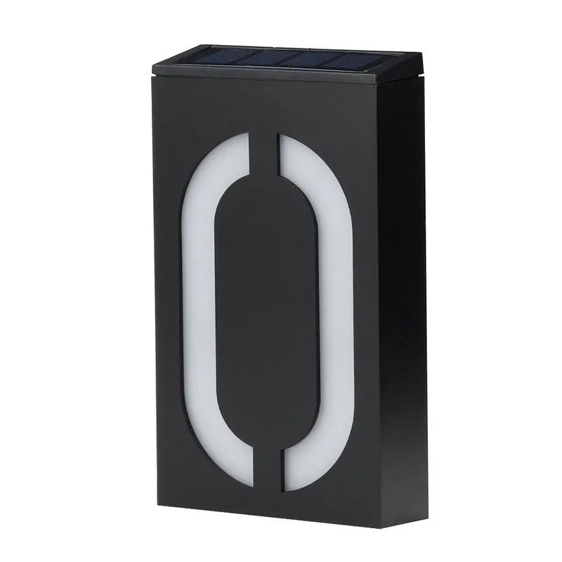 Solar powered illuminated house number light with digit '3' showing, mounted on a wall.
