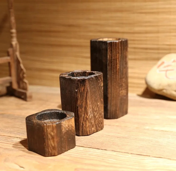 Solid paulownia wood candle holder with charcoal-fired finish, square 6cm top and 4.5cm candle opening