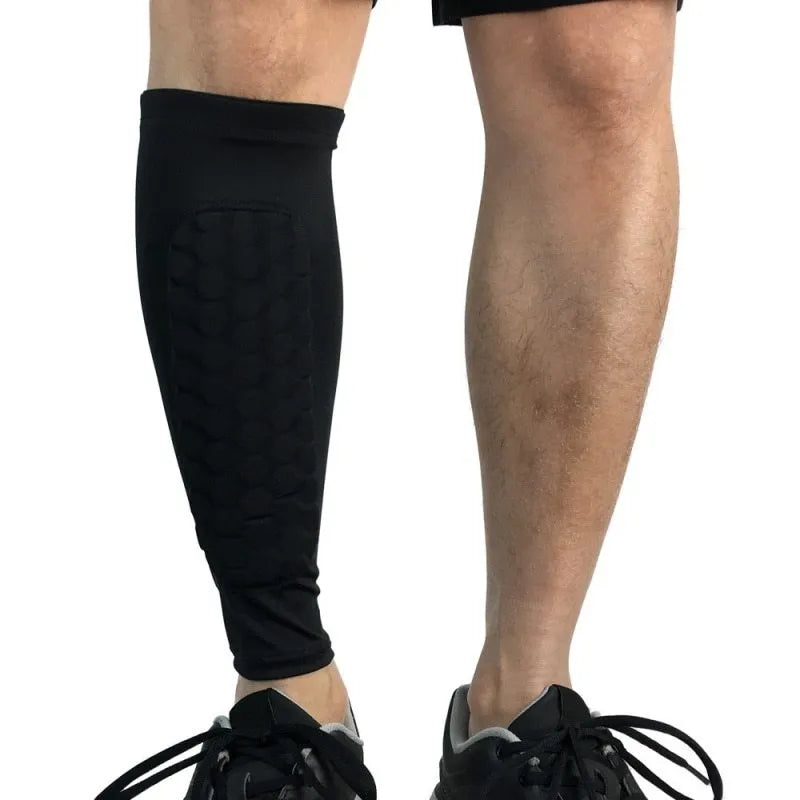 Lycra shin guard leg sleeve with silicone band in black, green or blue, sizes M L XL for football and training