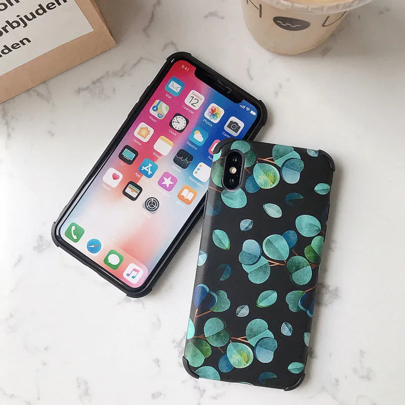 Black silicone iPhone case with raised leaf pattern texture on back