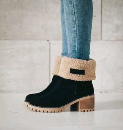 Women's mid-calf suede snow boot with thick heel on a waterproof platform.