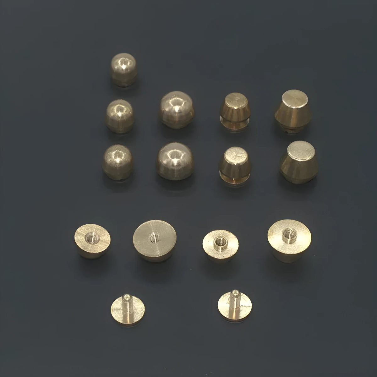 Brass decorative buckles in 10x6mm and 12x7mm sizes with round and geometric foot nail shapes