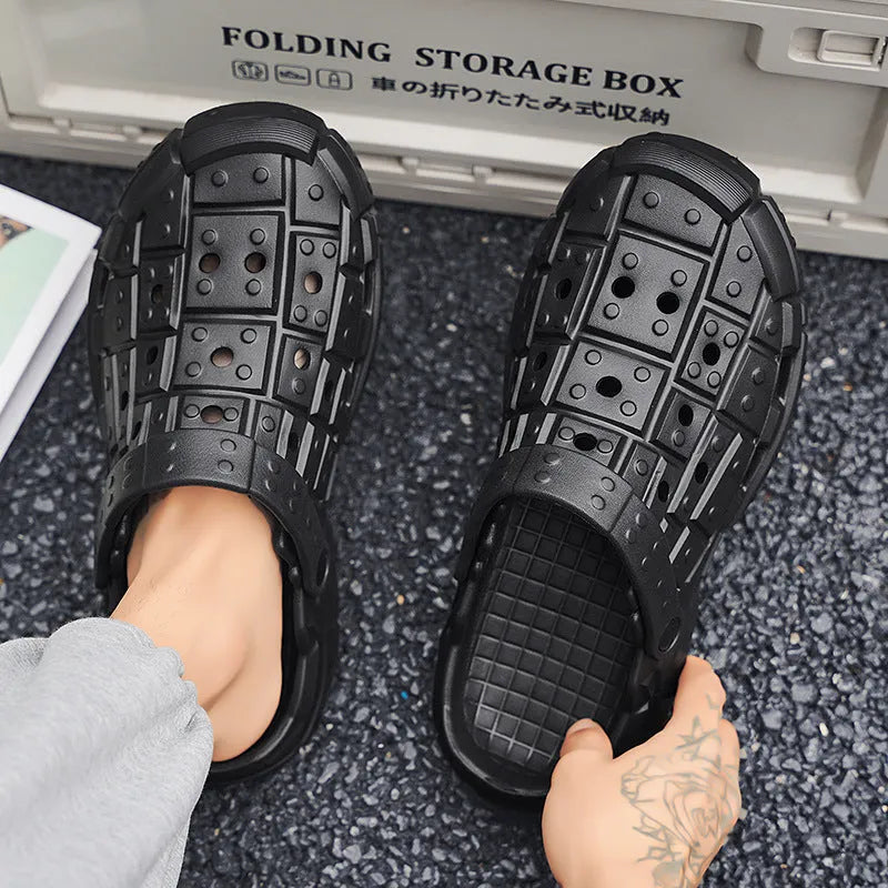Men's sand-coloured EVA hole shoes with a thick non-slip sole and toe holder design on a plain background.