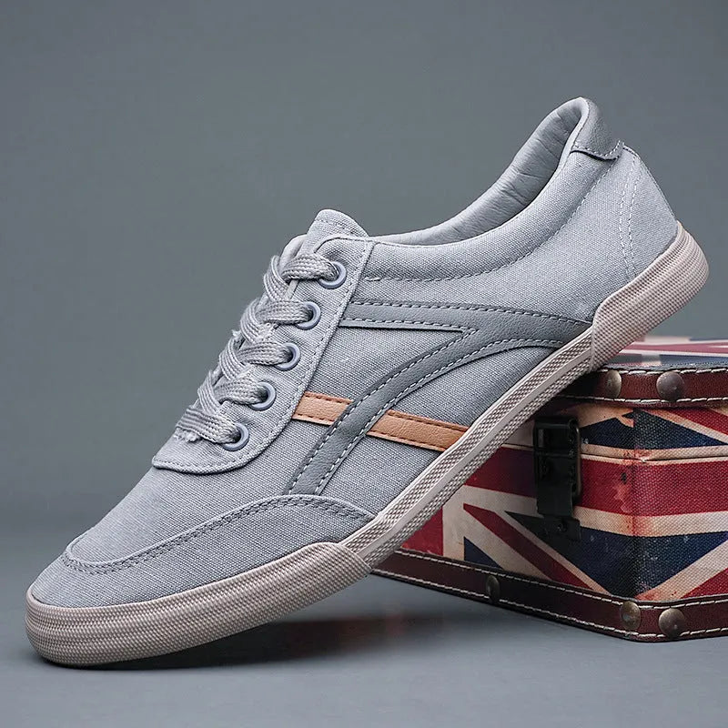 Men's breathable canvas casual shoes, low top flat heel with front lace-up, shown in solid colour options