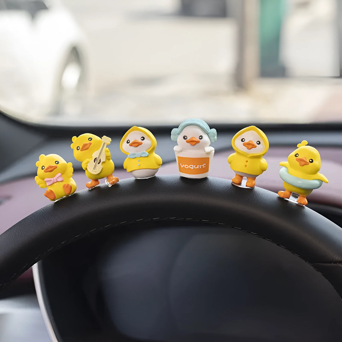 Cartoon duckling car decoration set with six PVC ducks and rectangular dashboard sign