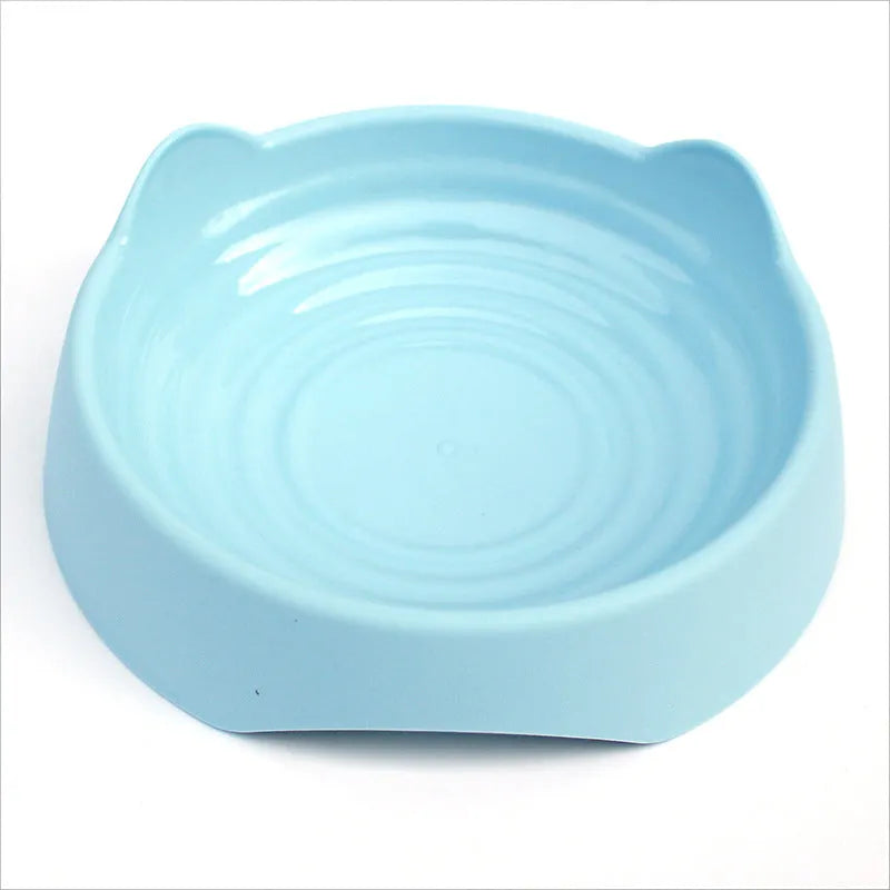 Blue ceramic dog slow feeder bowl with internal maze pattern for small, medium, and large breed puppies.