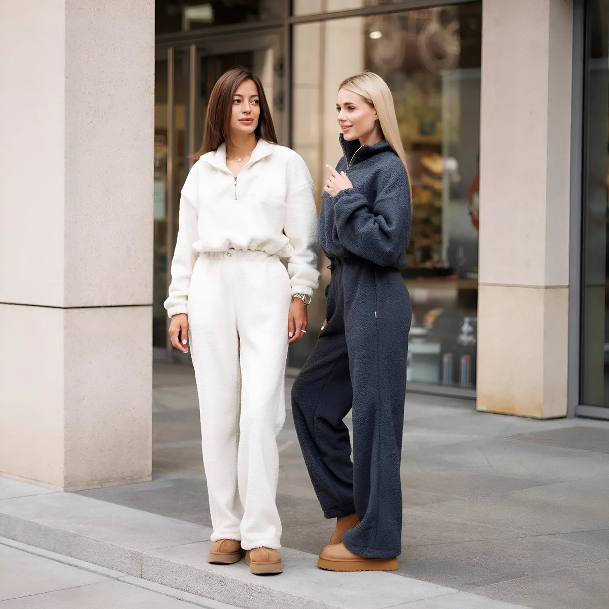 Polar fleece two-piece suit with long sleeve half pull top and trousers in solid grey or white, sizes S M L.